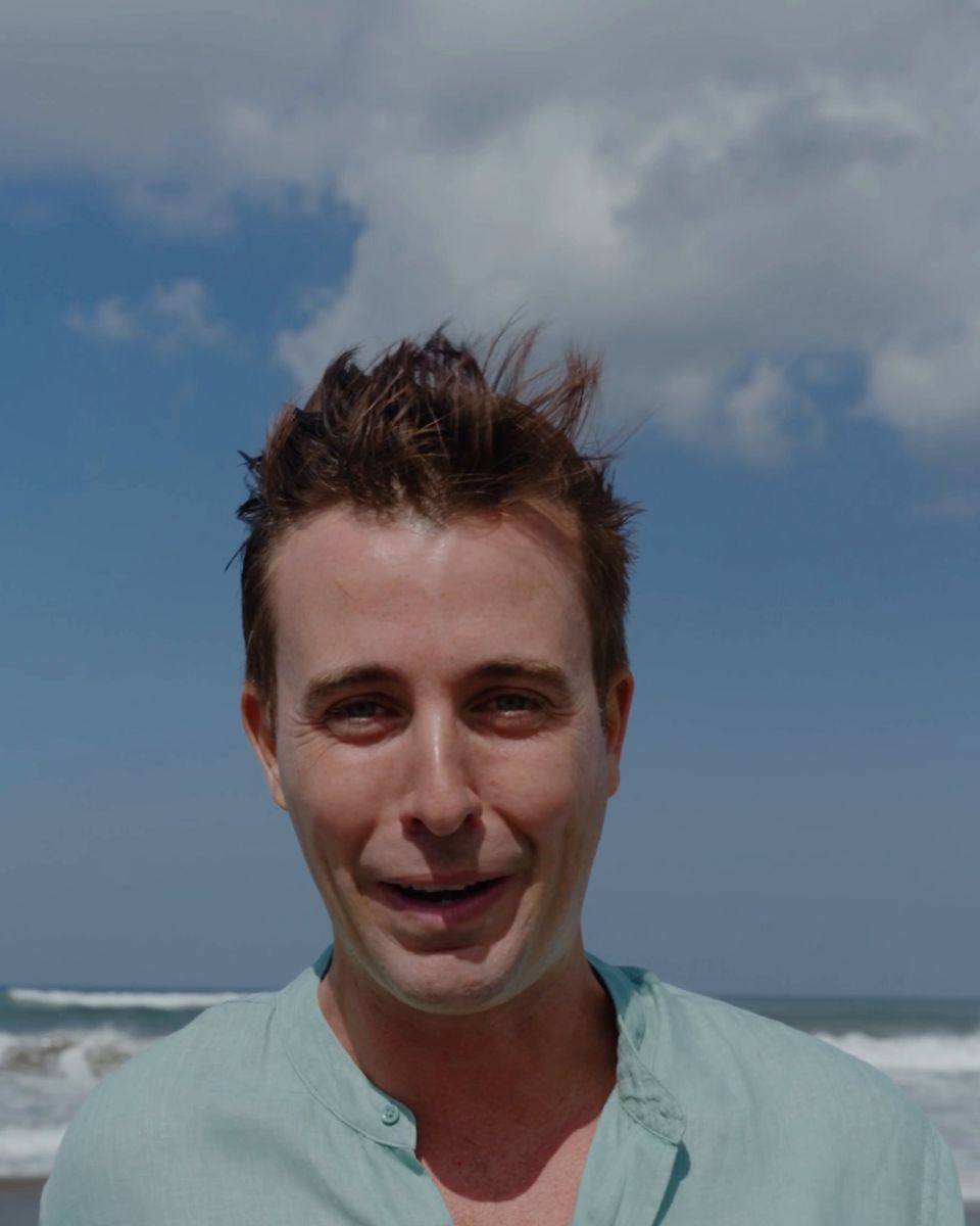 Carlos de Ory smiling on the beach in Sumba